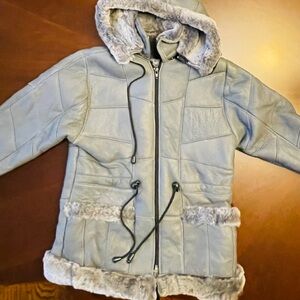 shearling jacket 
Warm coat for girls. New, newer worn.hard to find Similar.